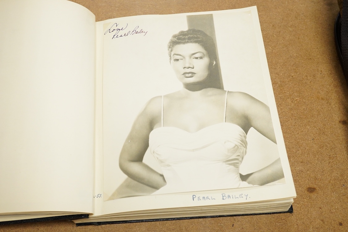 An album containing a wide selection of autographed publicity photographs of jazz and blues artists, including; Louis Armstrong, Chet Baker, Louis Bellson, Dave Brubeck, June Christy, Nat King Cole, Paul Desmond, Duke El